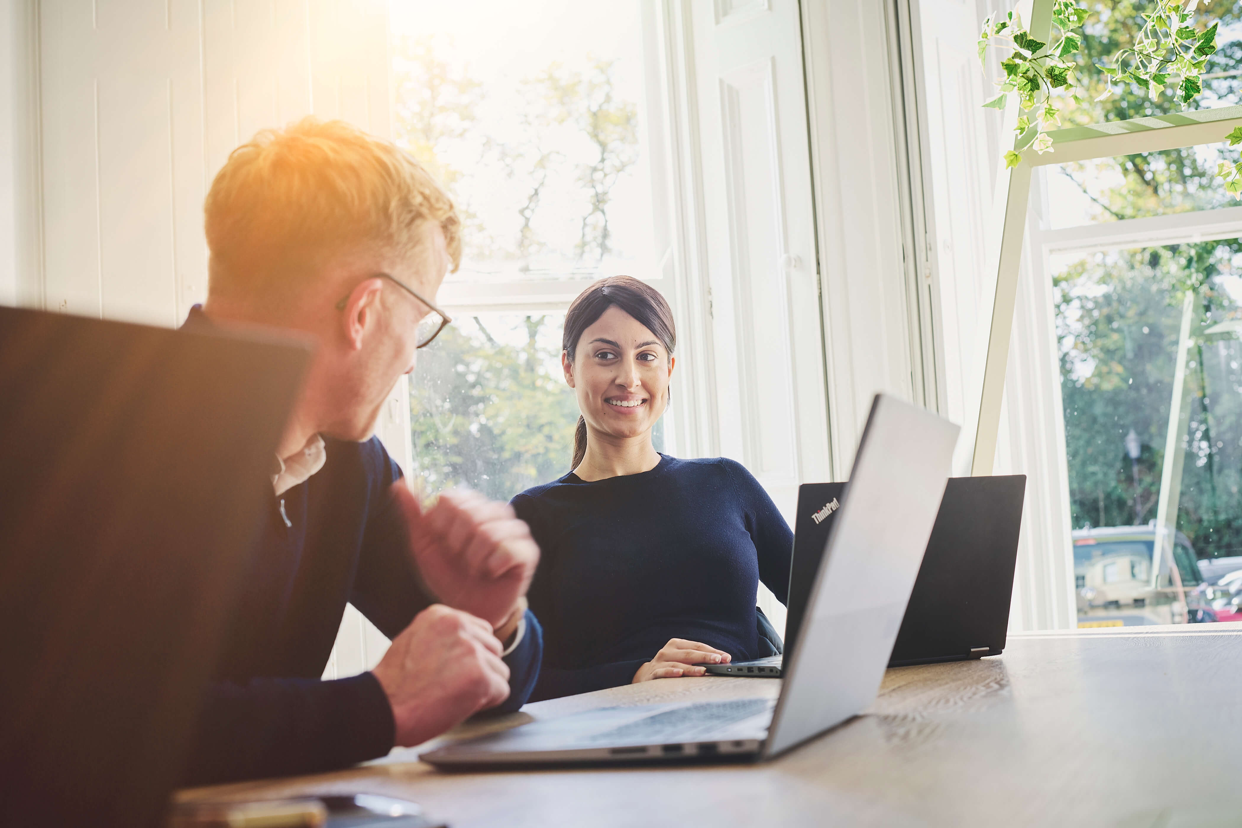 office workers conversing